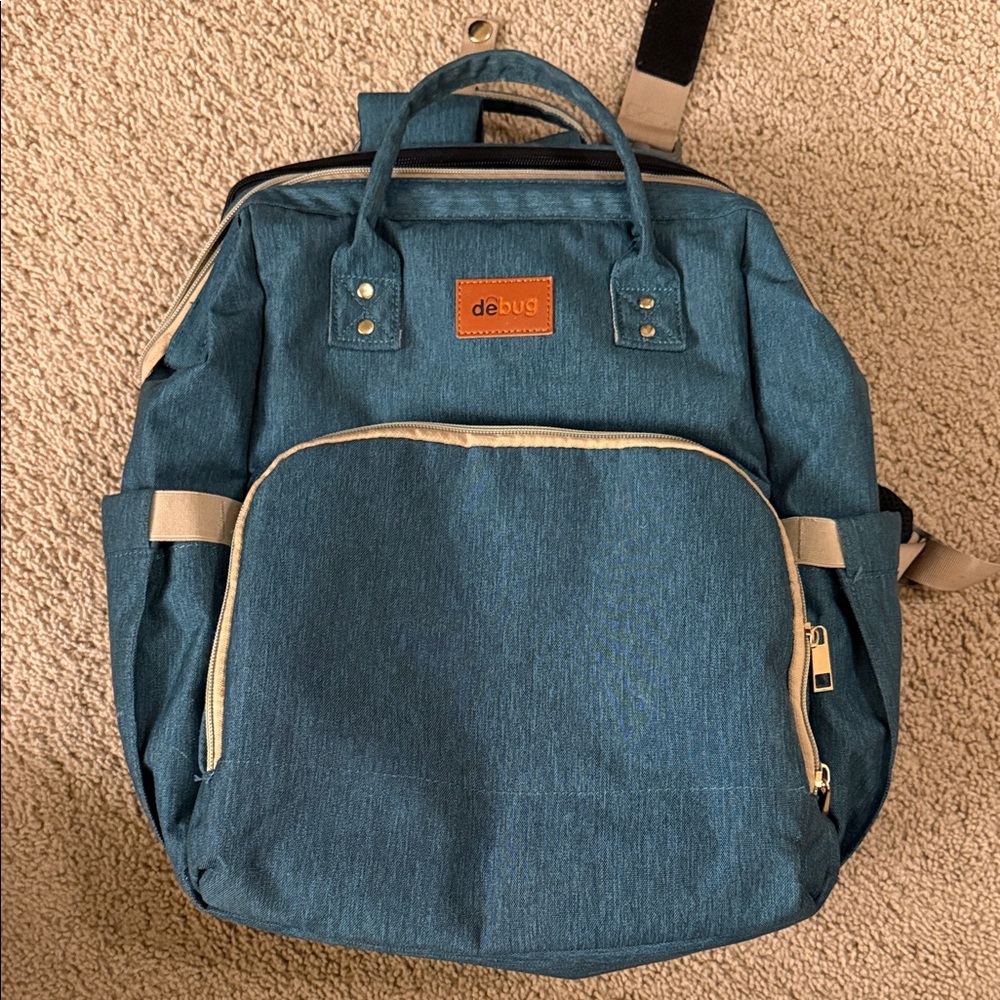 debug Teal Canvas Backpack for baby’s with Multiple Pockets.